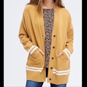 &.layered - collegiate cardigan sweater in mustard
